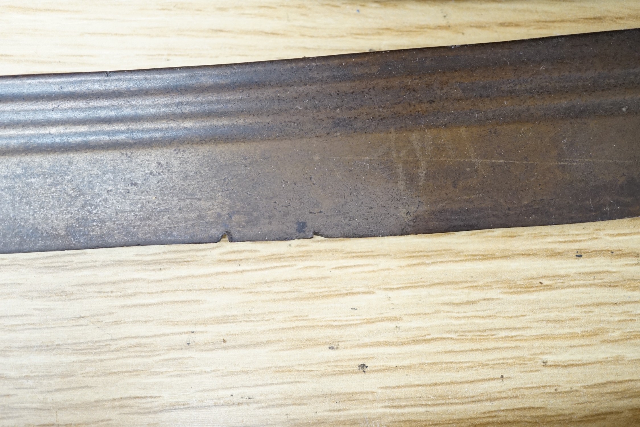 An Ottoman tulwar sabre, a European sabre and a leather whip